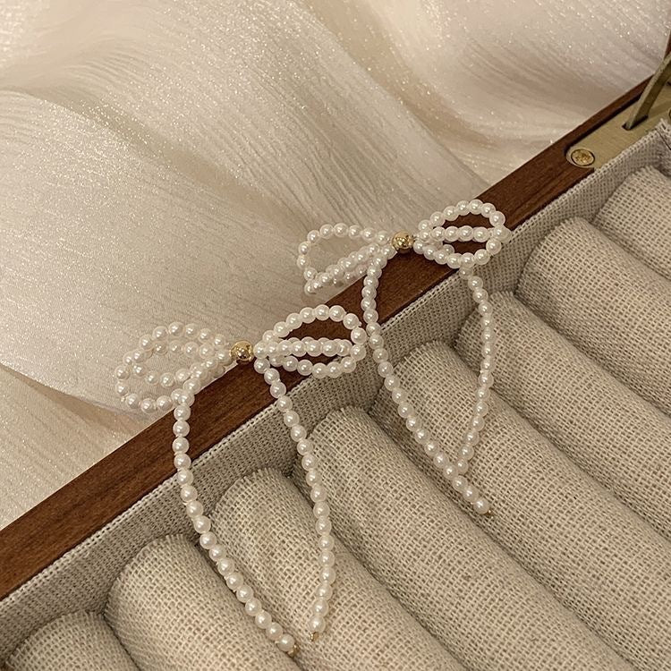 Pearl Bow earrings