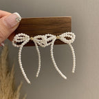 Pearl Bow earrings