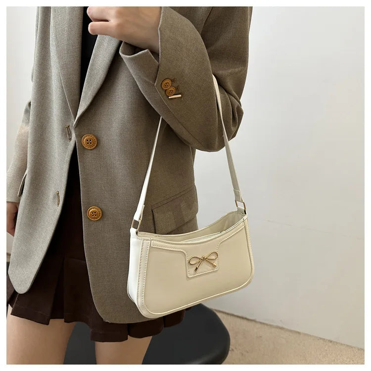 Shoulder bag with bow