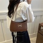 Shoulder bag with bow