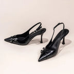 Pointed-Toe Buckle Pumps