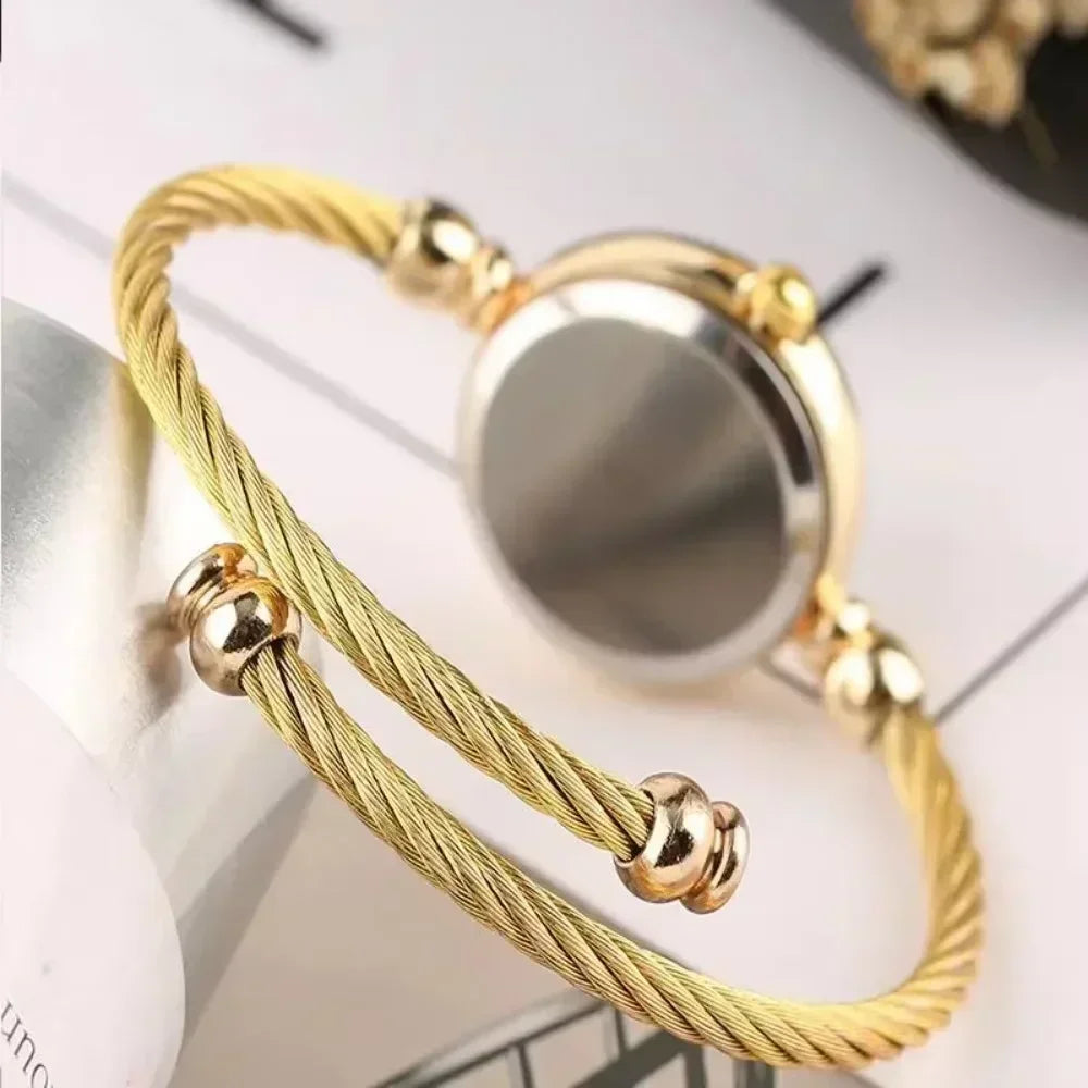 Golden bangle watch