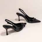 Pointed-Toe Buckle Pumps