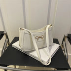 Shoulder bag with bow